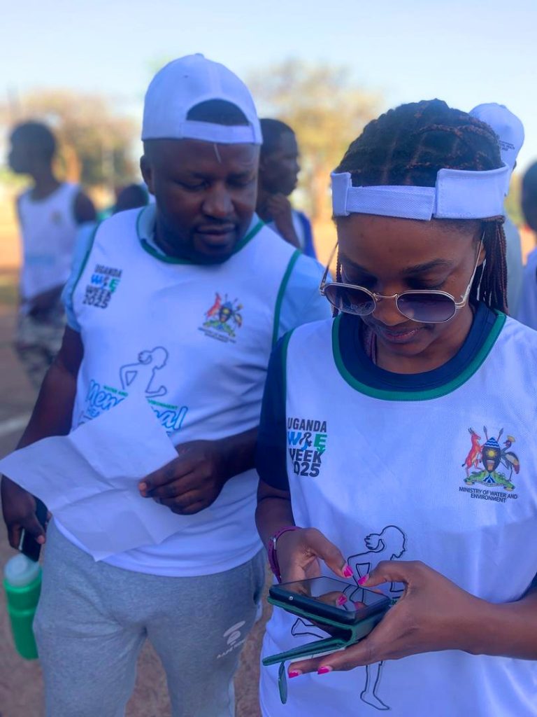 Gerald and Christine in presence for a menstrual run where we partnered with ministry of water and environment